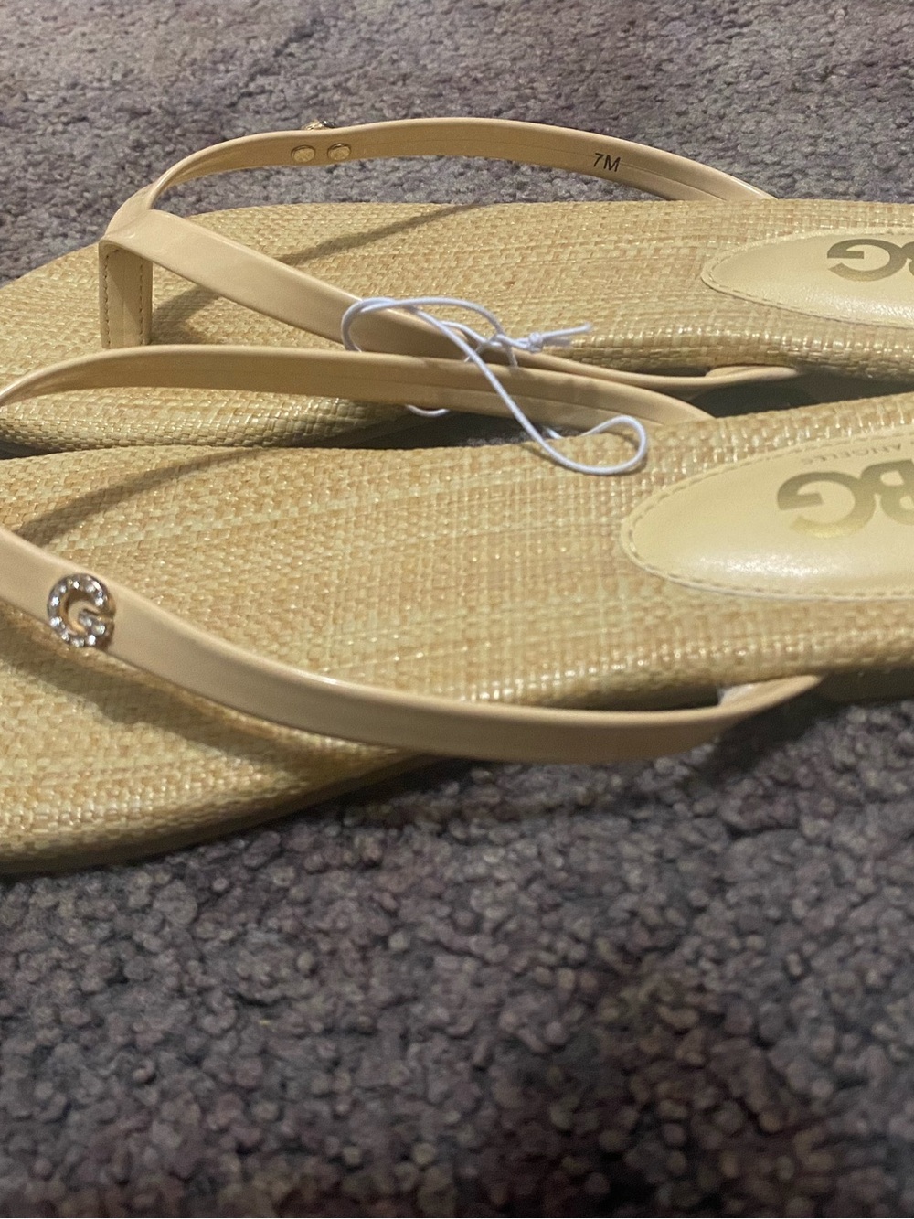 Women’s Beige Flip Flop Sandals with Subtle Logo Accent